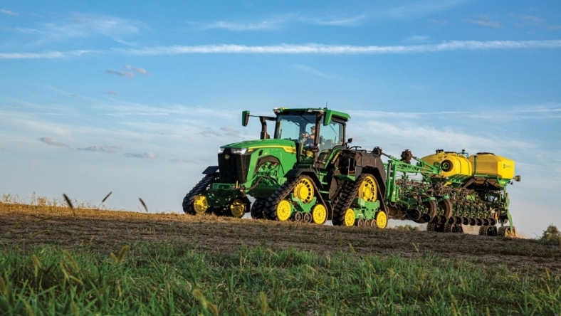 John Deere tractor with precision planter operating in field